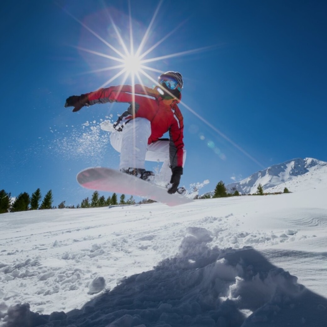 Snowboarden im Chaleturlaub in Österreich - Chaletdorf Österreich - ChaletZeit